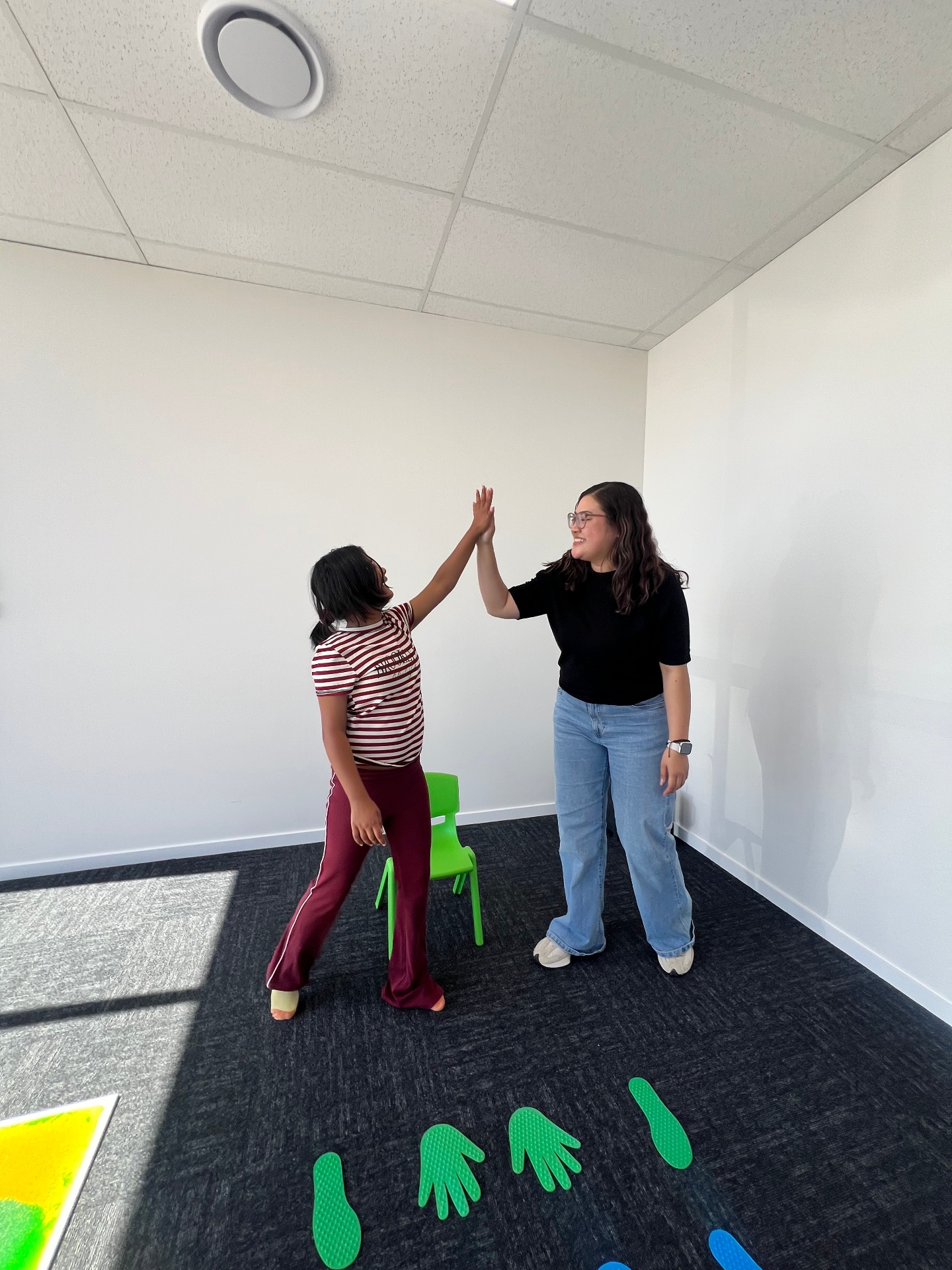 High five celebration after completing an activity