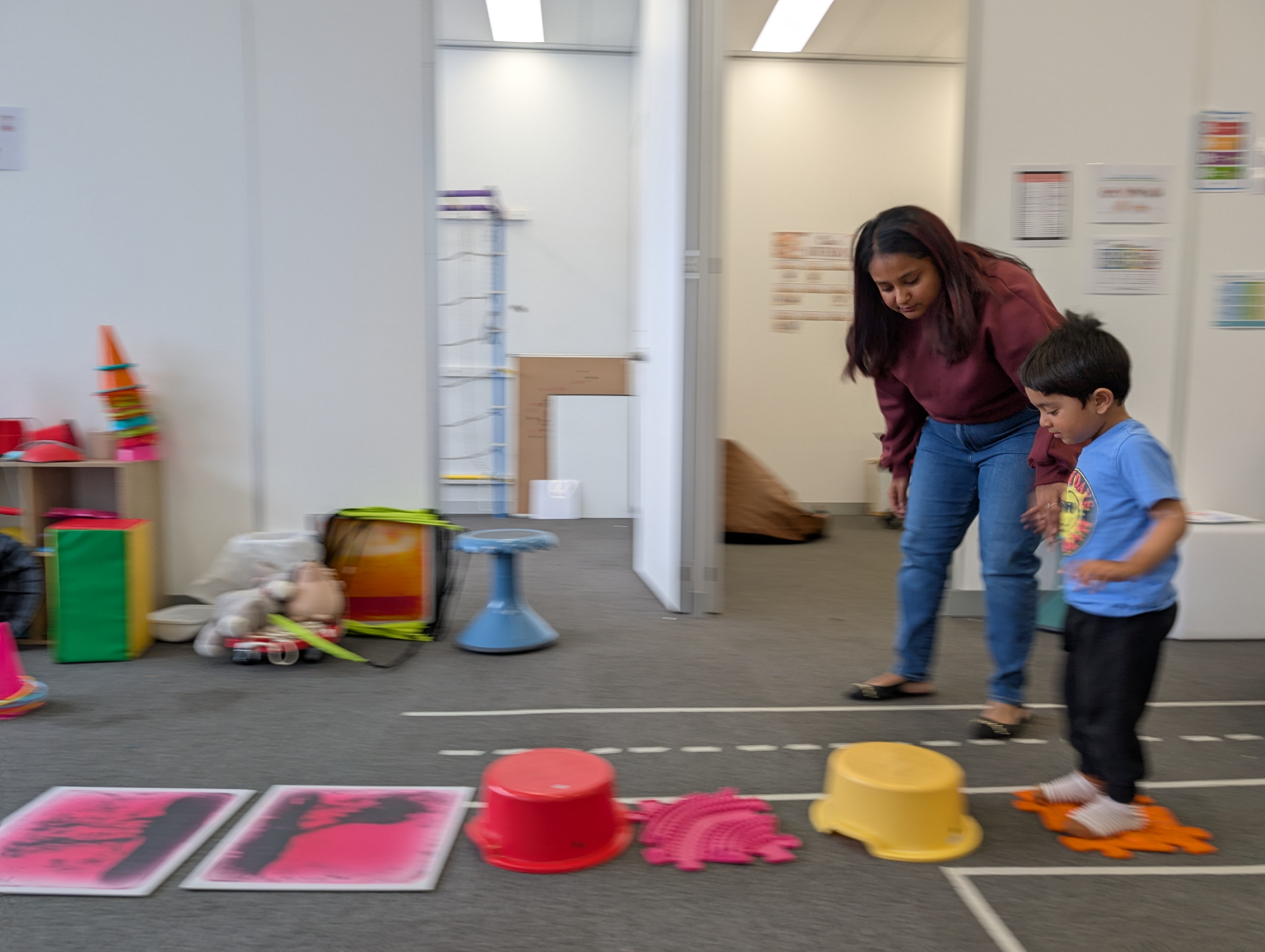 Child navigating obstacle course