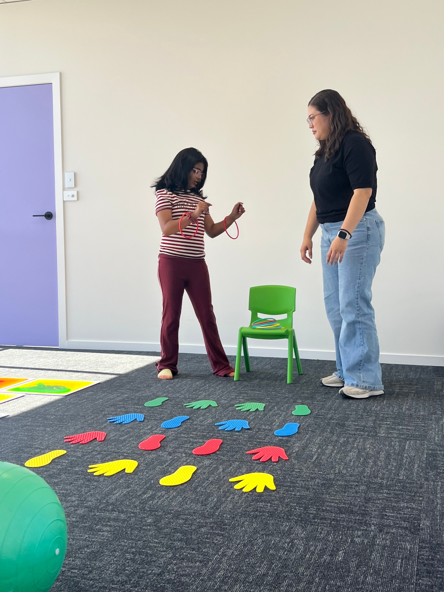 Practicing hand-eye coordination with ring toss