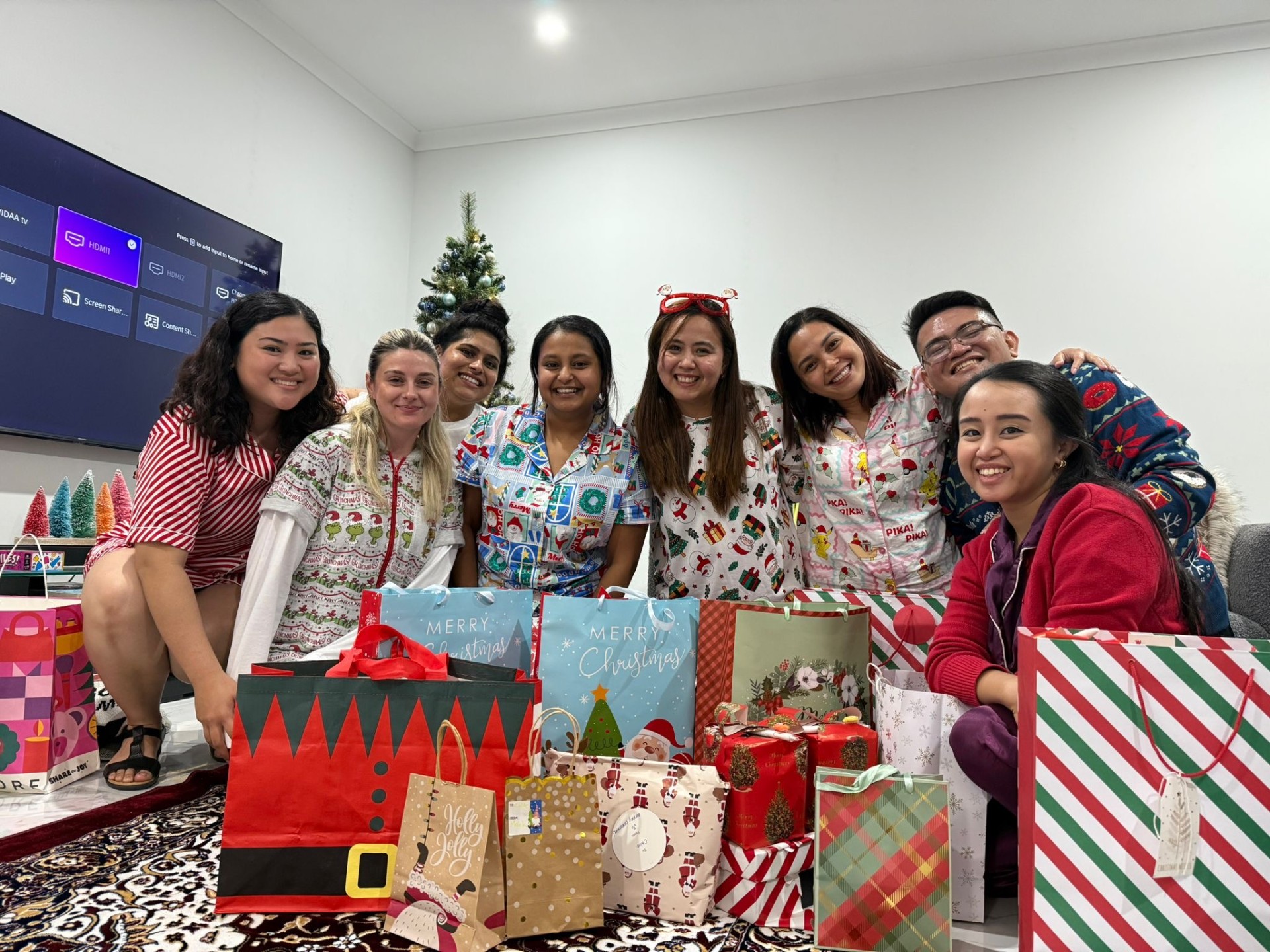 Team exchanging Christmas gifts