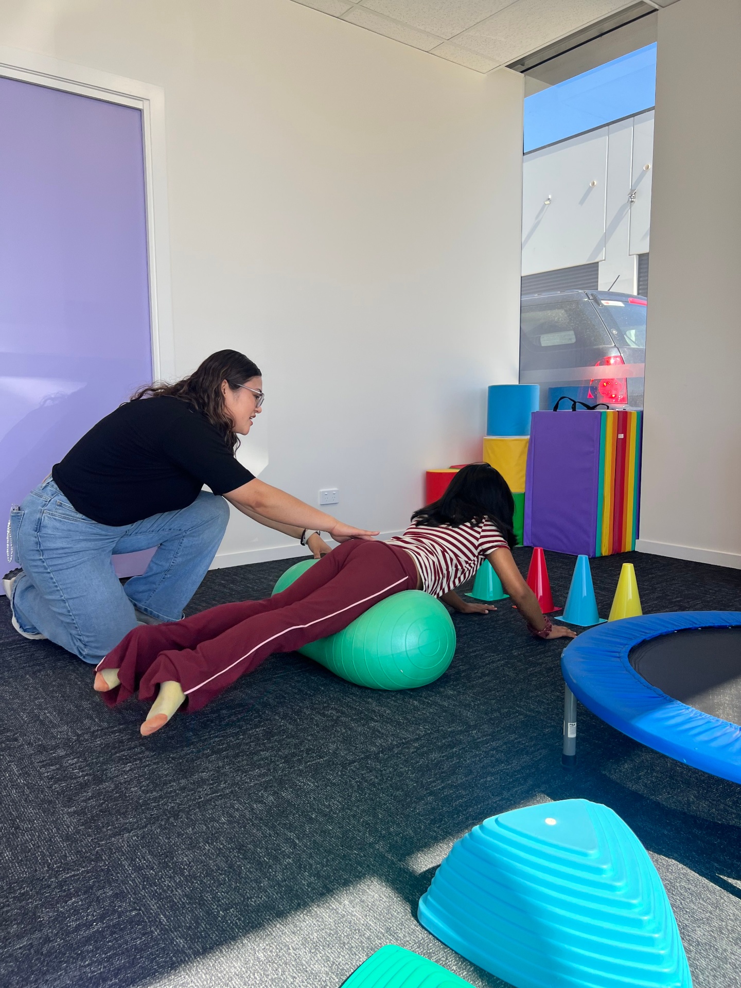 Core strengthening exercise on therapy ball