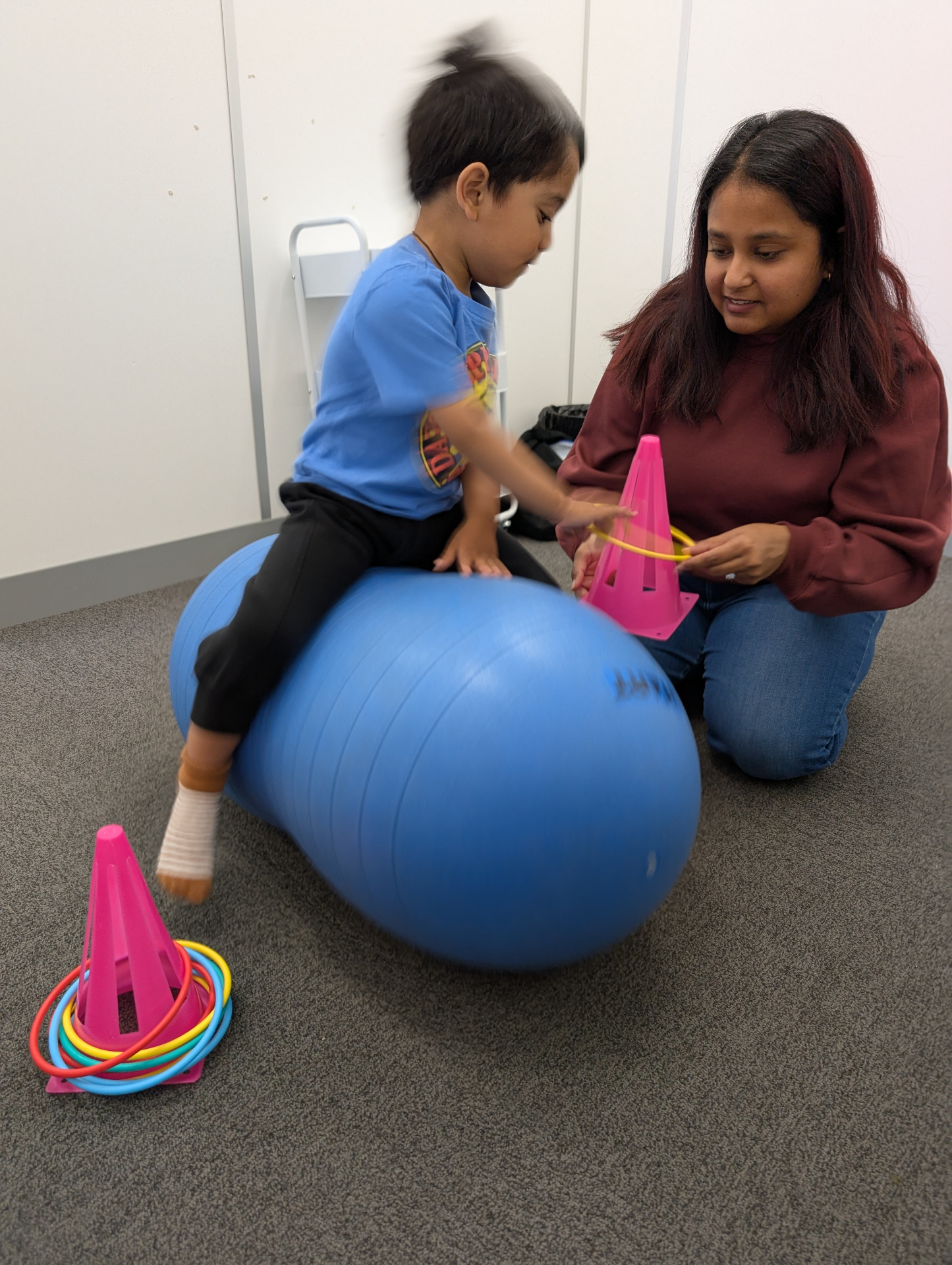 Therapy ball ring activity for core strength